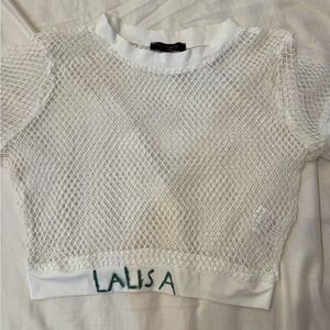 Mesh pattern crop top that says Lalisa